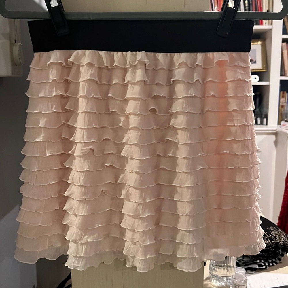 Light pink; ruffle mini skirt